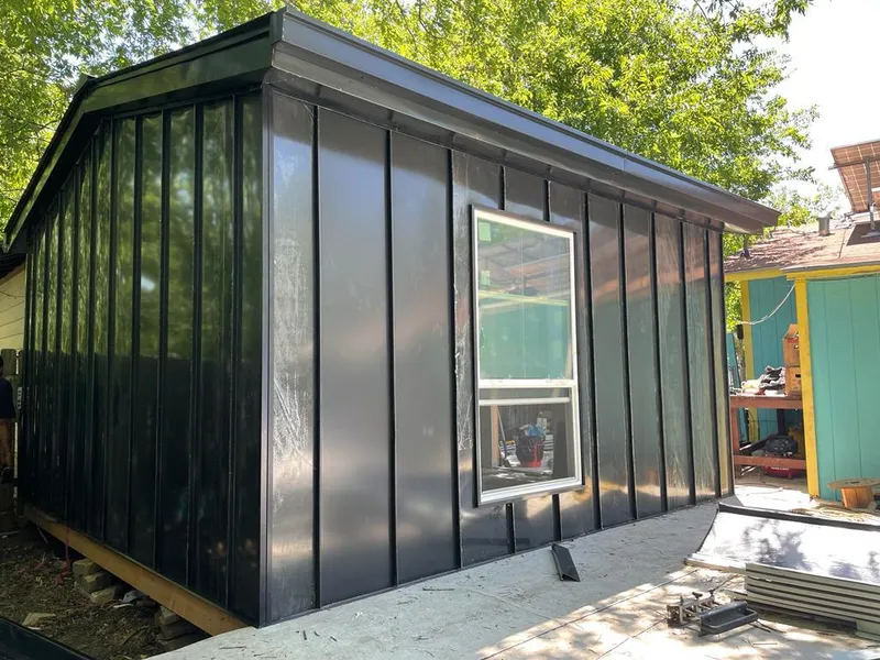 Black standing seam metal wall panels for Metal Roof Installation in Port Sheldon