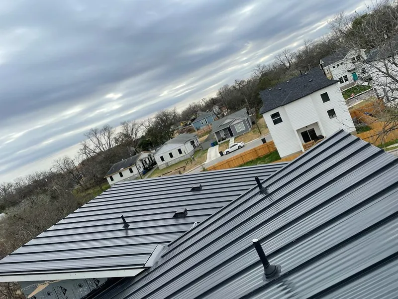 Standing seam metal roof panels with vents for Skylight Repair in Port Sheldon